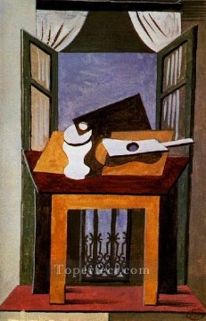 Naturaleza muerta sobre una mesa frente a una ventana abierta 1919 Pablo Picasso Pinturas al óleo